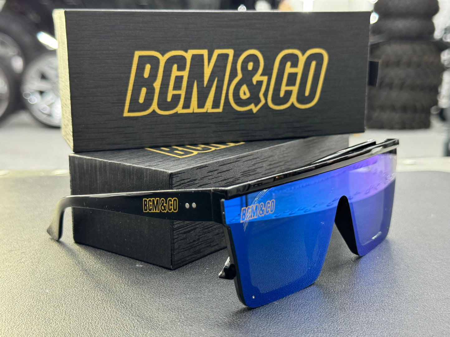 Special edition, teal and black sunglasses