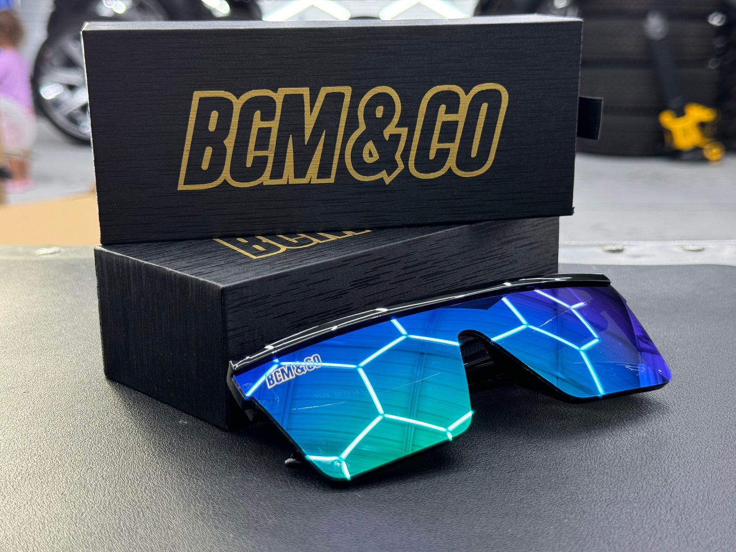Special edition, teal and black sunglasses